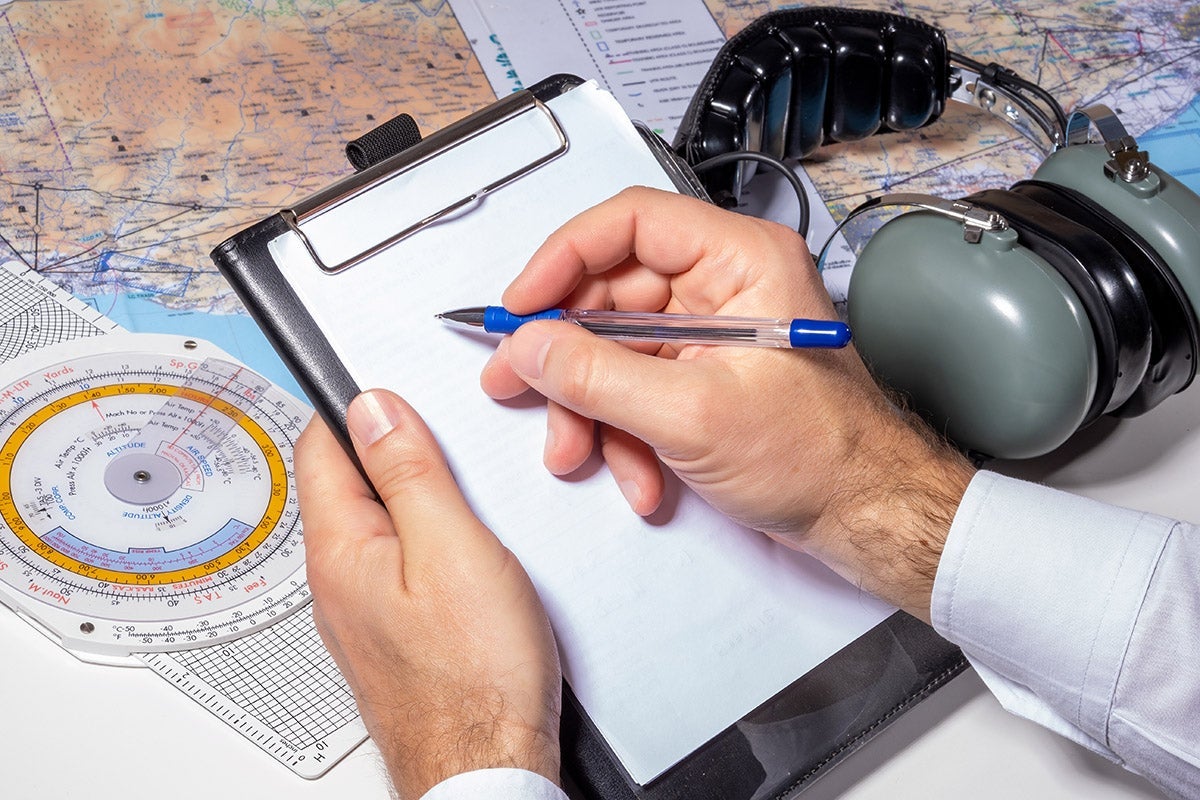 In ground school, student pilots learn important skills such as how to access and interpret weather, calculate aircraft performance, and use a checklist. [Credit: Adobe Stock]