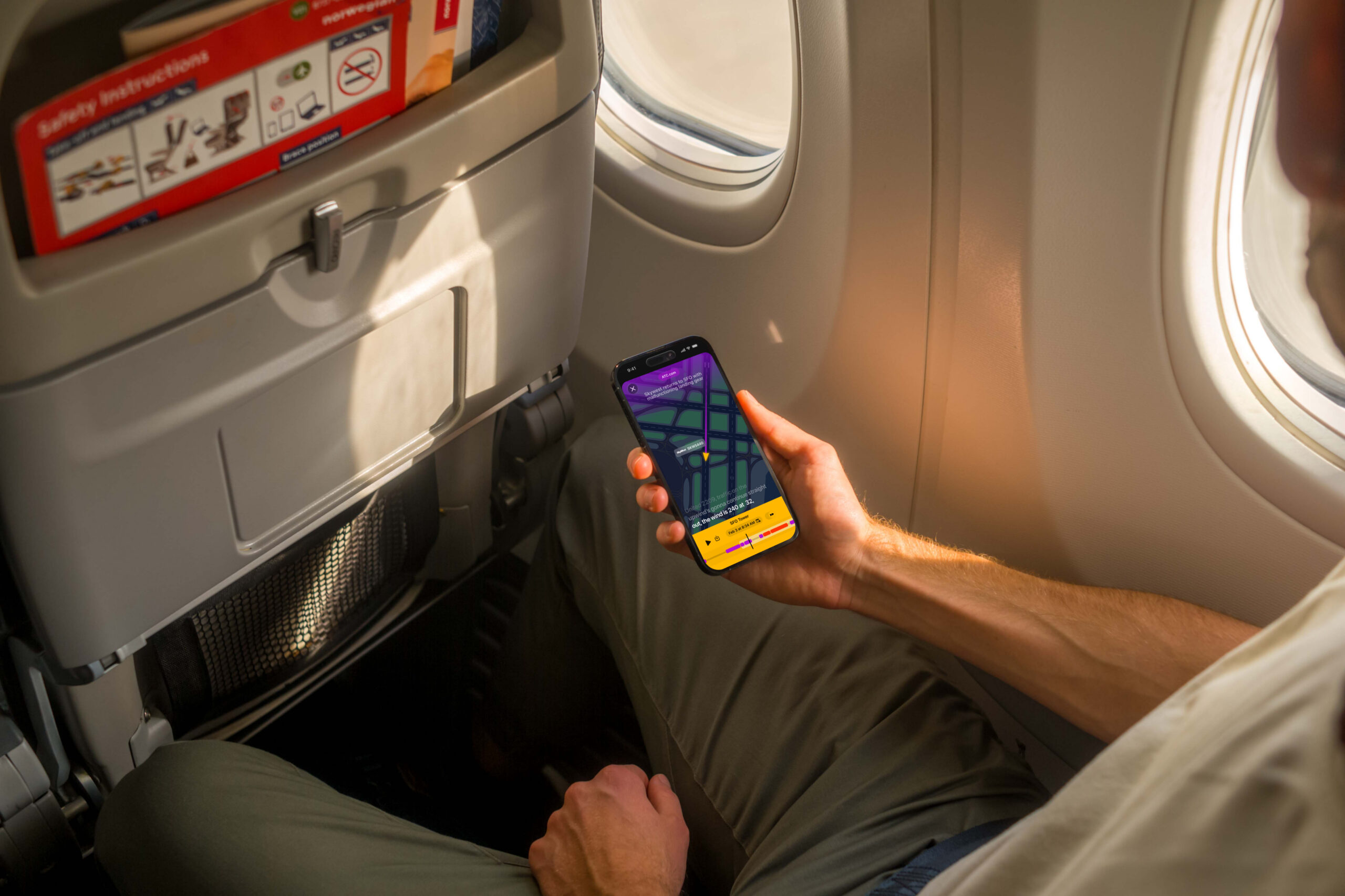 airline passenger uses the ATC app on an iPhone