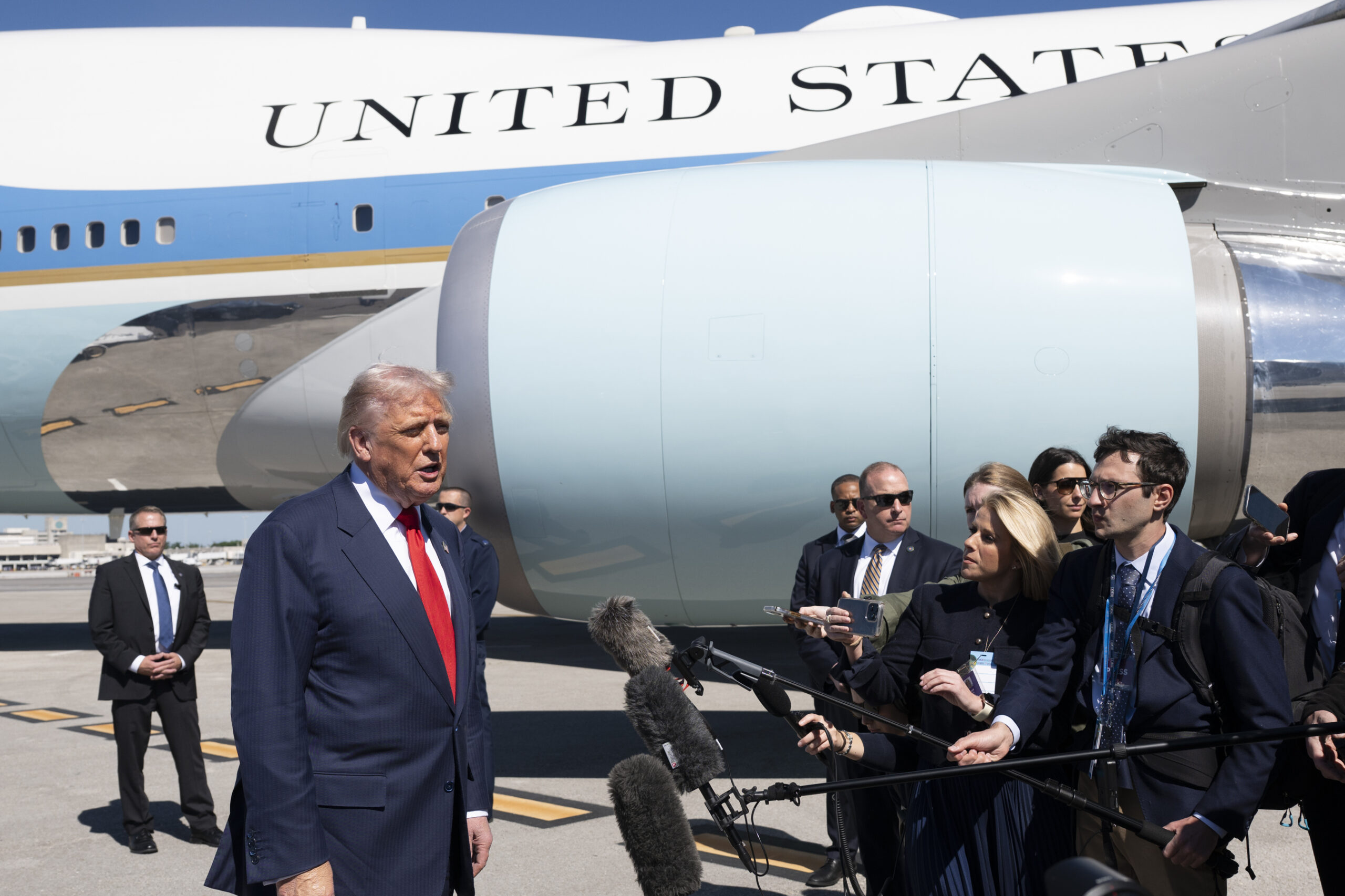 President Donald Trump disembarks Air Force One at Palm Beach International Airport, Florida. [Credit: Official White House Photo/Joyce N. Boghosian]