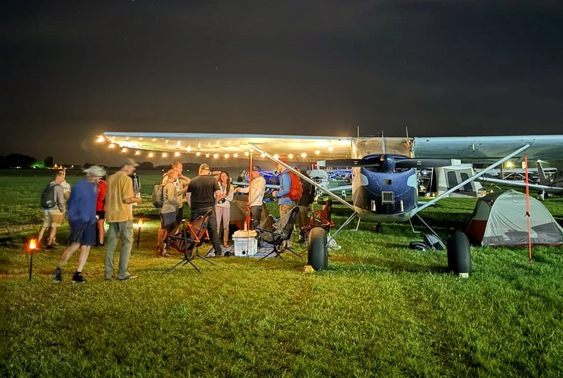 Camping under an airplane tips