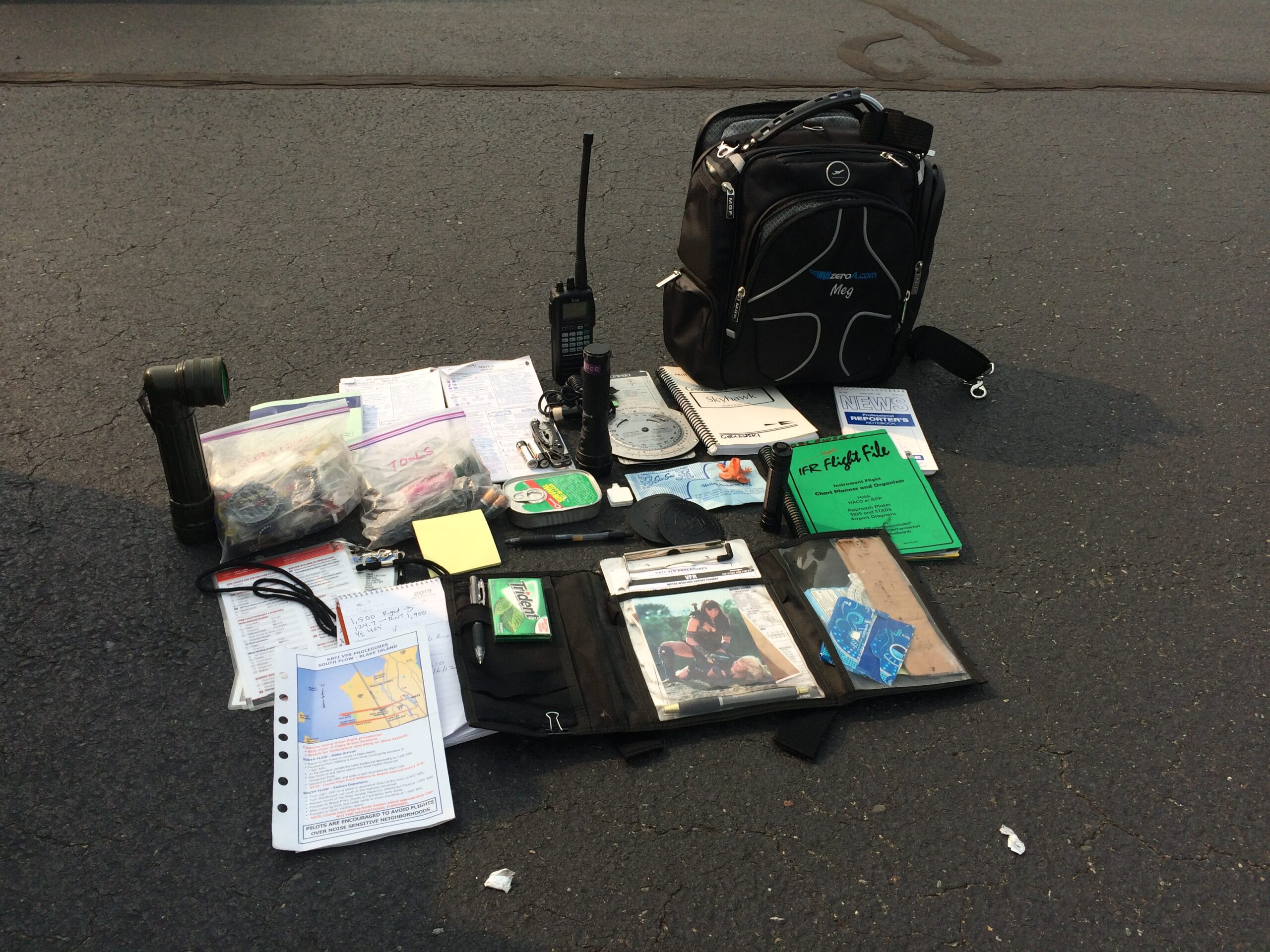 By the time you become a CFI, the gear bag is filled with instructional tools, and the headset has a bag of its own. [Credit: Meg Godlewski]